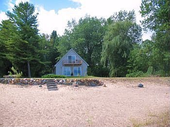 A LITTLE PIECE OF PARADISE! If you have been looking for a semisecluded lakefront propery with a nic