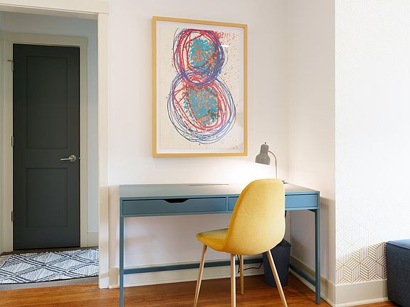 Desk next to hallway to bedrooms and bath.