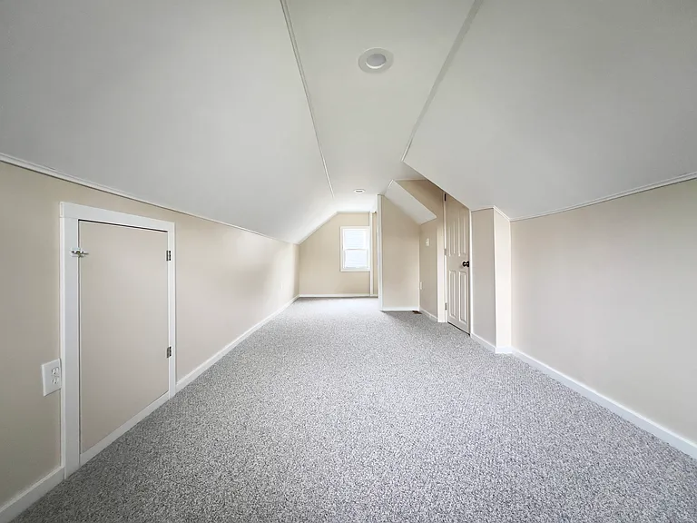 3rd Bedroom with new carpet, recessed lighting, closet and hidden storage