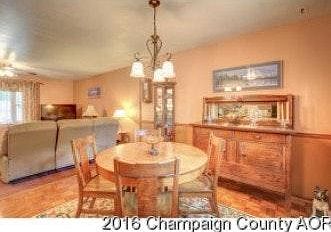 Dining room open floor plan newly painted grey and beige colors