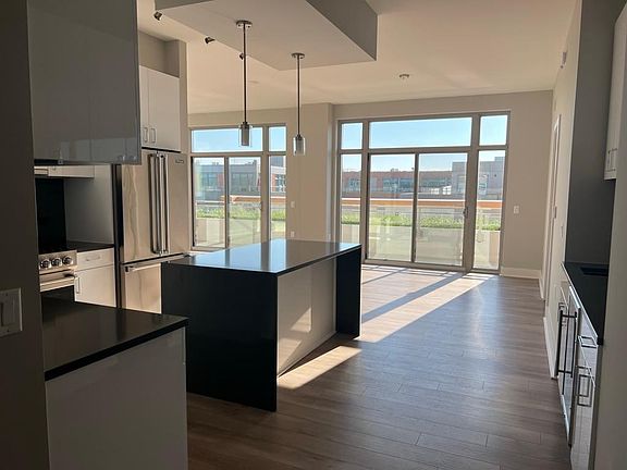 Kitchen and dining area, view from entryway.