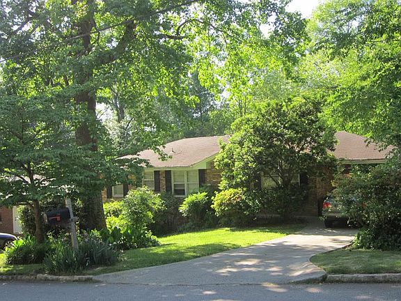 Front of house with off-street parking.