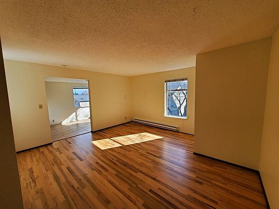 Living room with new refinished hardwood floors