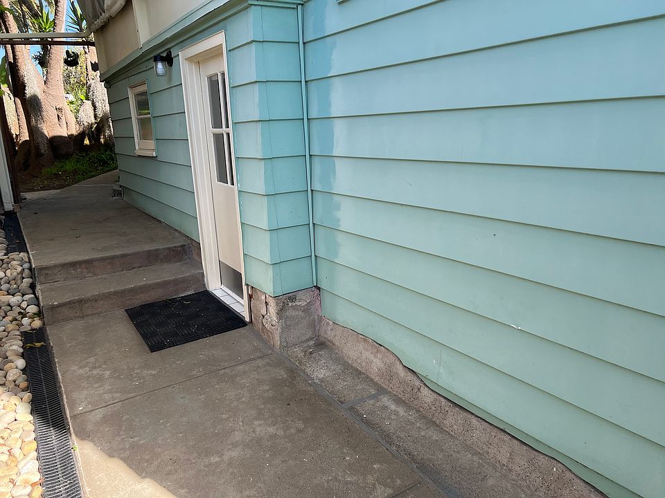 View of front door and front gated entrance