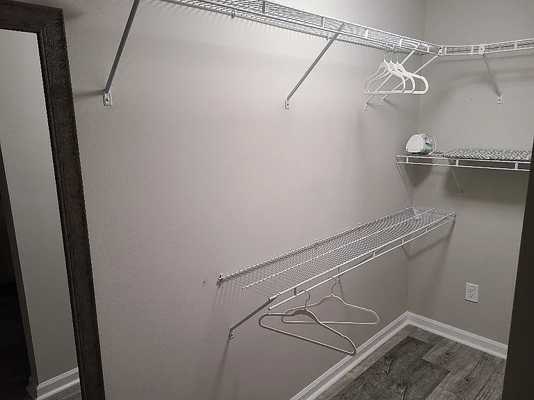 HUGE walk in closet in main bedroom
