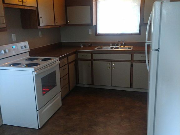 New floors and appliances in kitchen!