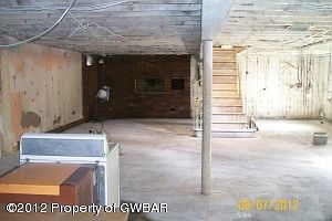 basement with fireplace