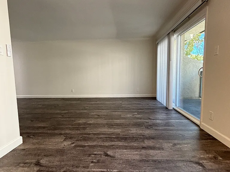 Very Spacious Livingroom Area with Plenty of Natural Light