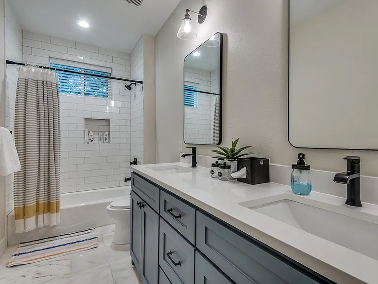 guest bathroom, with dual sinks