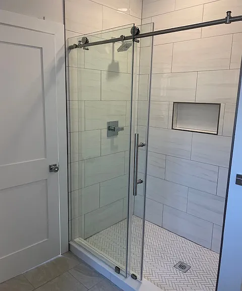 Beautiful tile in both walk-in showers.