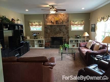 Family room
						:
						Sunken family room with fireplace