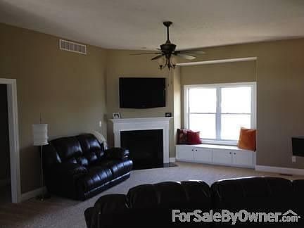Living Room
						:
						Corner fireplace and window seat. TV wired through wall!