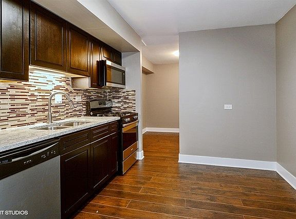4th image of 7724 Woodward Ave #14-8G