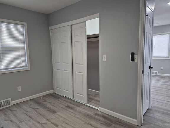 bedroom with double door closet