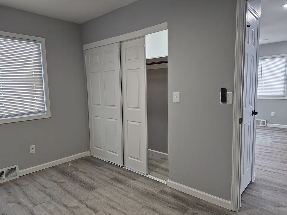 bedroom with double door closet