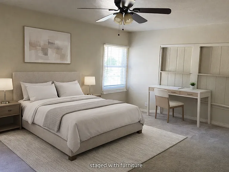Large master bedroom with lots of space for bedroom furniture, dresser and desk