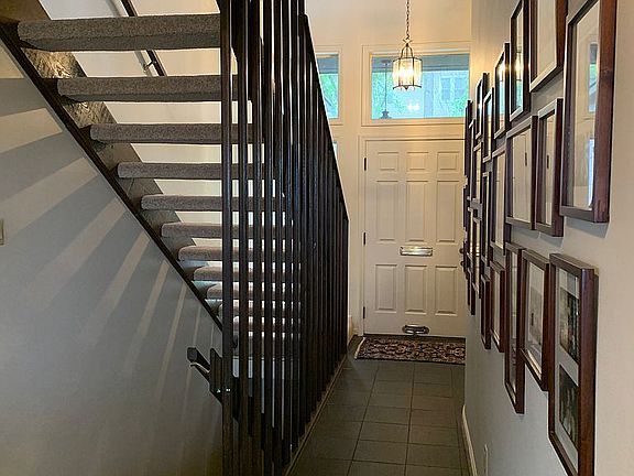 Front door and entry hallway