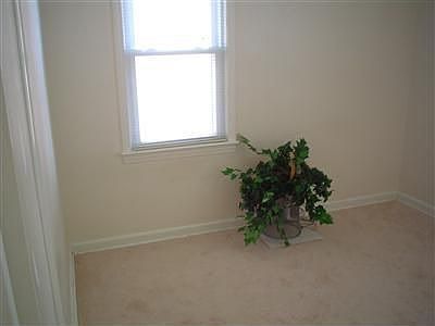 QUIET AND AIRY 2ND BEDROOM ON THE FIRST FLOOR ALSO BOASTS TWO WINDOWS.