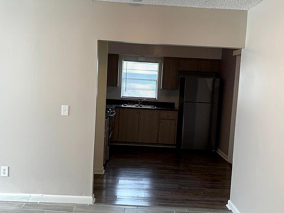 from the living room, facing the kitchen