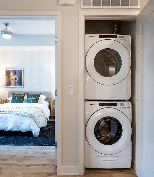 Full-sized stackable washer and dryer in all homes