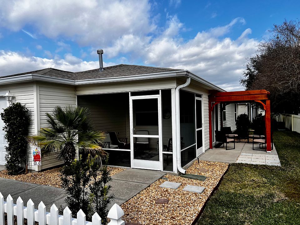 Entrance to Villa with front porch and outside space to enjoy!