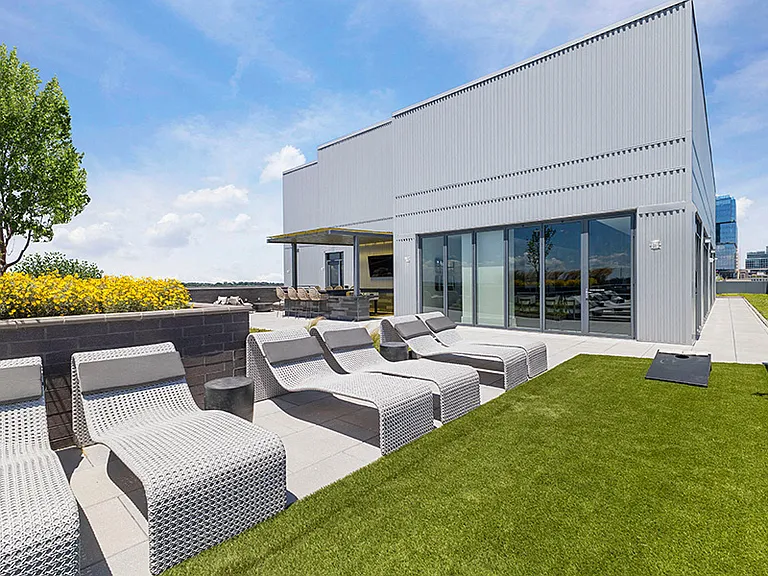 Rooftop lounge seating areas and grilling stations