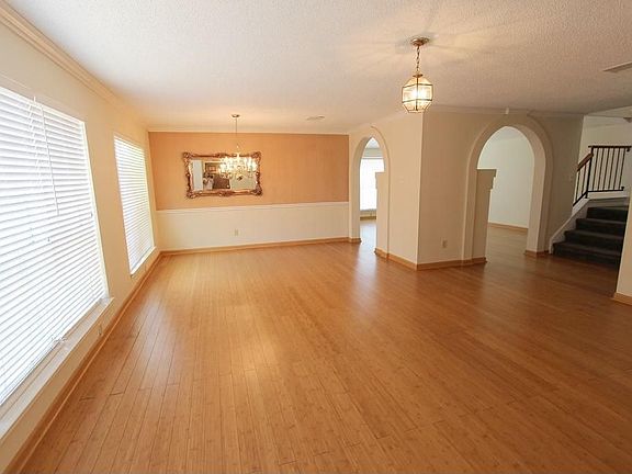 Welcome to this home with beautiful wood floors - in the family room....