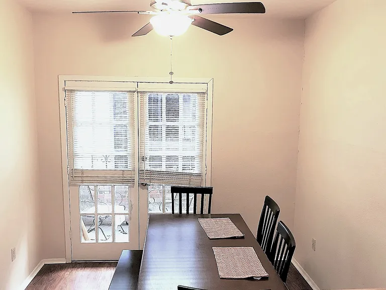 The French door brings in a abundancy of natural light for the dining room and leading to a private porch.