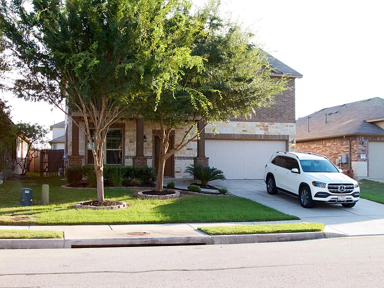 4705 Randig Lane. Irrigation system and lawn care service in place.