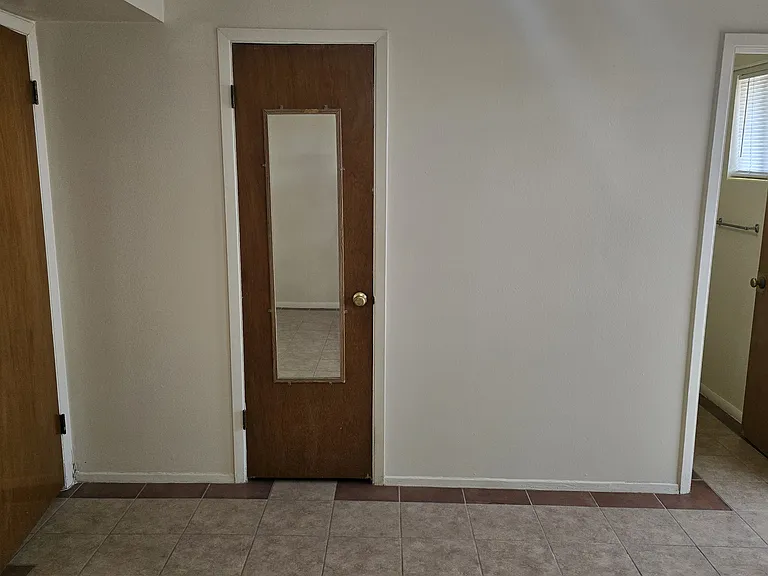 Bedroom looking at closet door