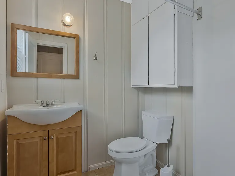 Photo 20. Second full Bathroom with shower attached to third Bedroom