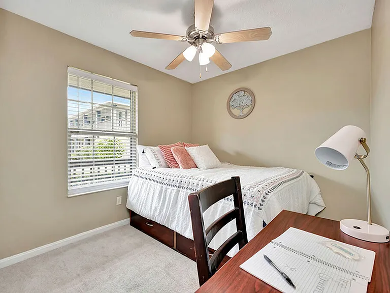 Bedroom with Desk Area, Spacious Closet and Light Kit at The Commons Student Apartments in Oxford, OH