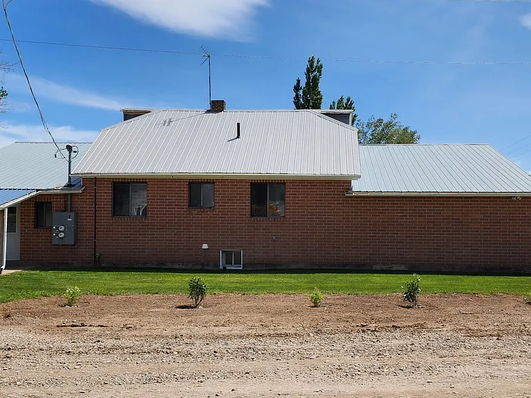 Kitchen and Garage Entrances with Backyard