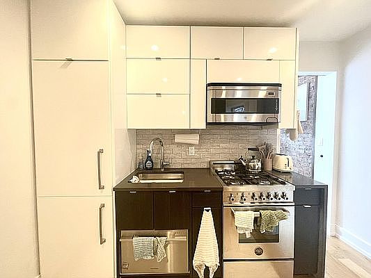 2nd image of 510 E 12th St APT 12