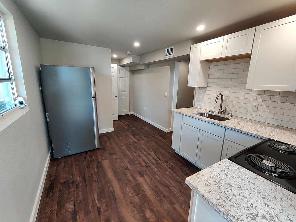 Kitchen (outdated photo - updated with hurricane impact window)