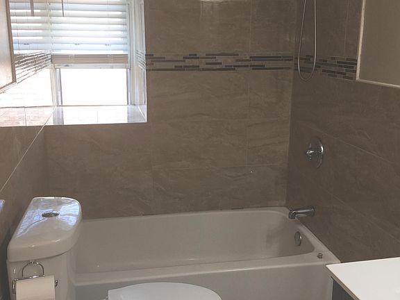 Large bathroom with linen closet