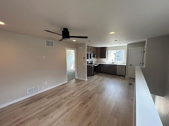 Living room opening to kitchen