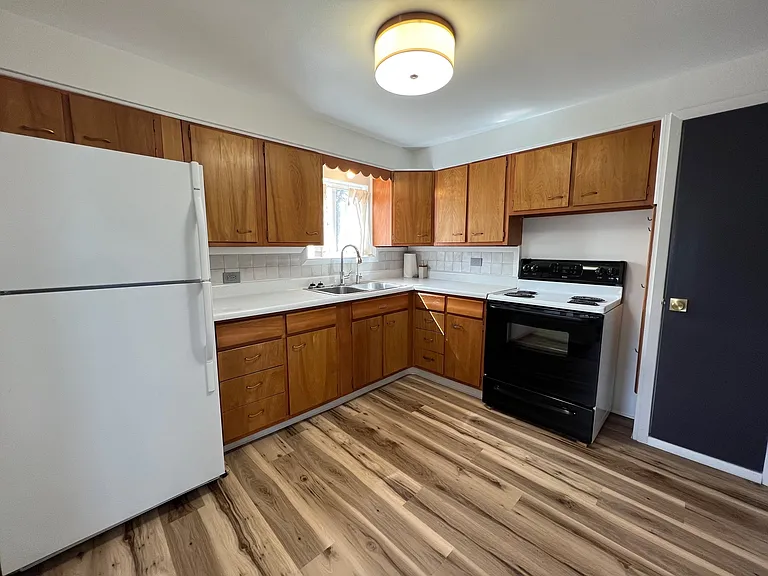 Kitchen with brand new luxury vinyl plank floors