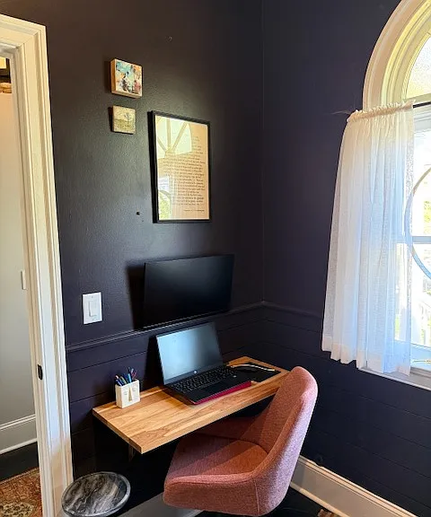 Downstairs front office/sitting area.