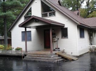 9602 Maple St, Rapid City, MI 49676