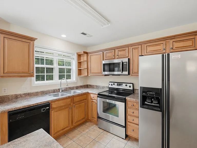 7100 Blossom Cir — Photo 6