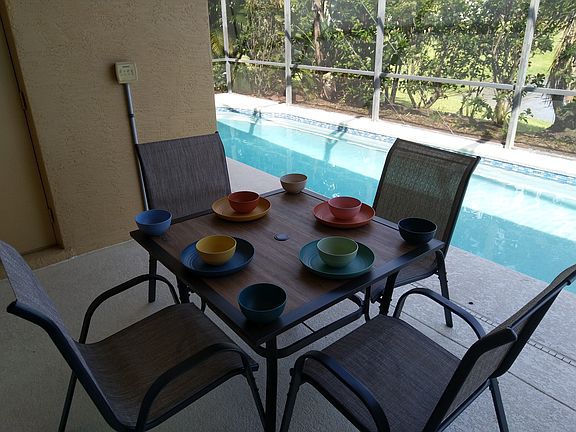 Tropical plants and trees such as Fishtail palms and flowering Hibiscus and Viburnum plants provide serenity and privacy to the lanai. The pool is long enough to be used as a lap pool.
