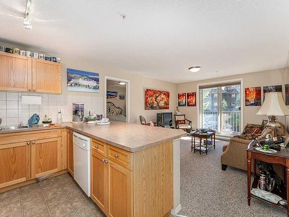 4th image of 186 N Kananaskis Way #216