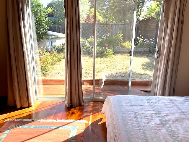 Master bedroom facing backyard