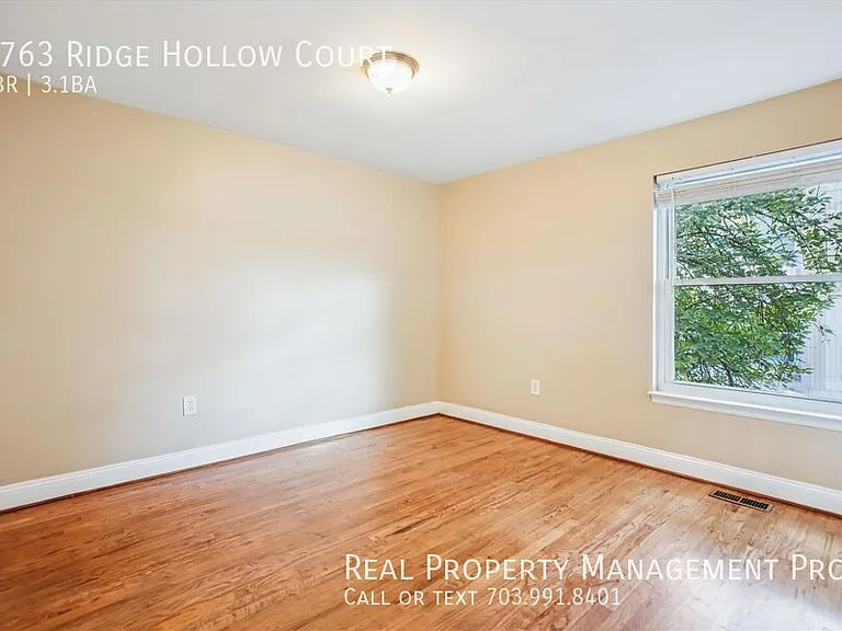 8763 Ridge Hollow Ct — Photo 17