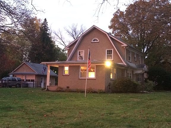 Detached garage on left