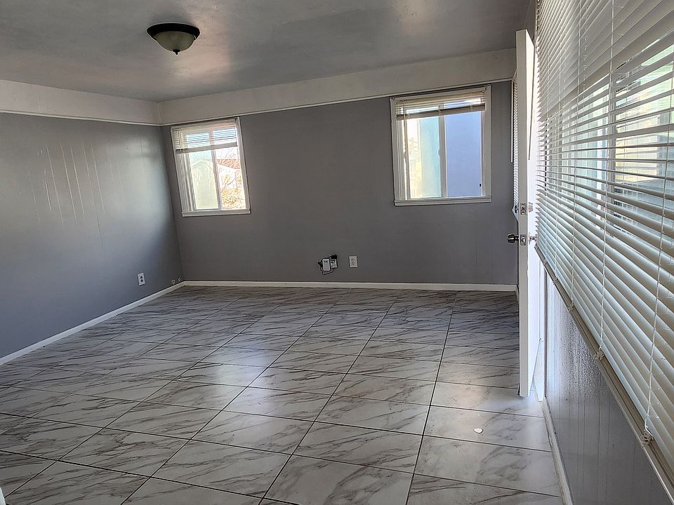 Newly furnished living room with tiles.