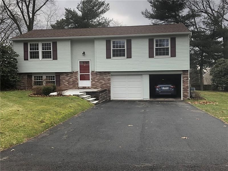 Located on cul-de-sac, this three bedroom split level home has recently been painted with new garage doors and repaved driveway.