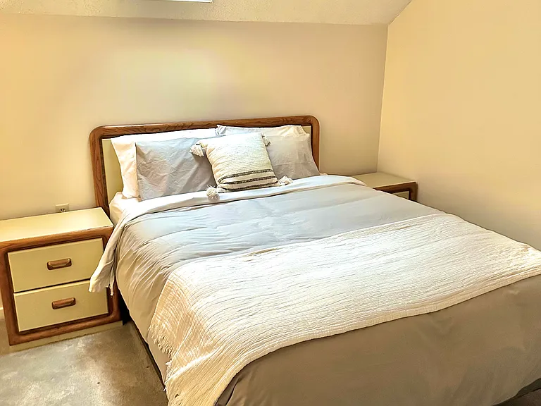 Queen bed in loft