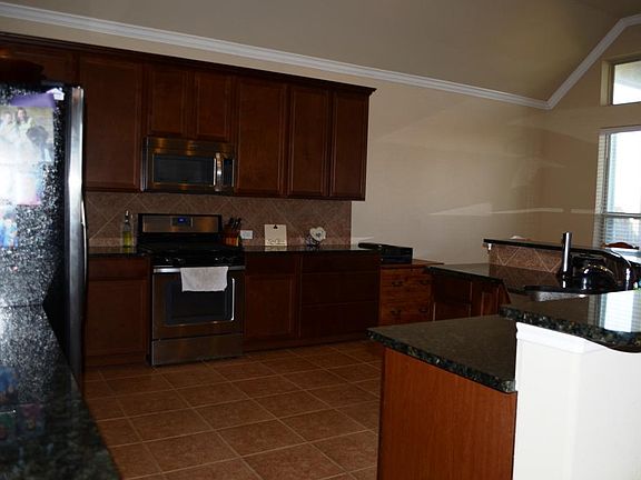 Large Open Island Kitchen with Lots of Cabinet, Counter Space, Wide Island w/Breakfast Bar and Granite Counter Tops
